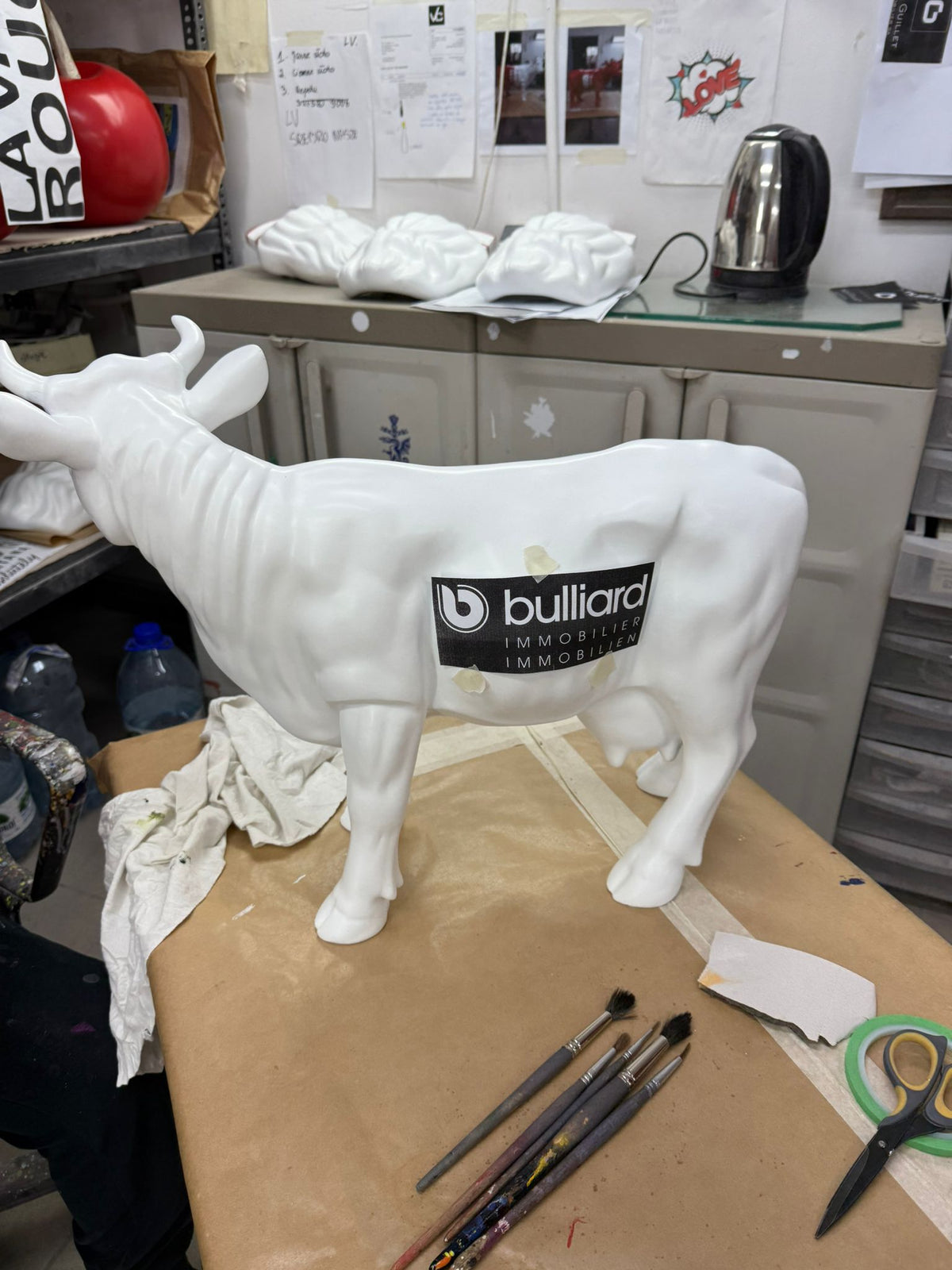 Application d’un logo d’entreprise sur une vache Kuhtag