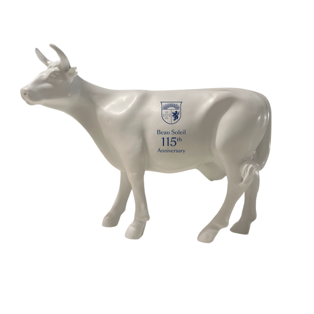 Petite vache Kuhtag blanche au logo de Beau Soleil, cadeau d’entreprise